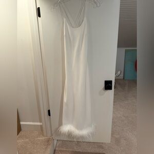 Elegant White Slip Dress with Feather Hem